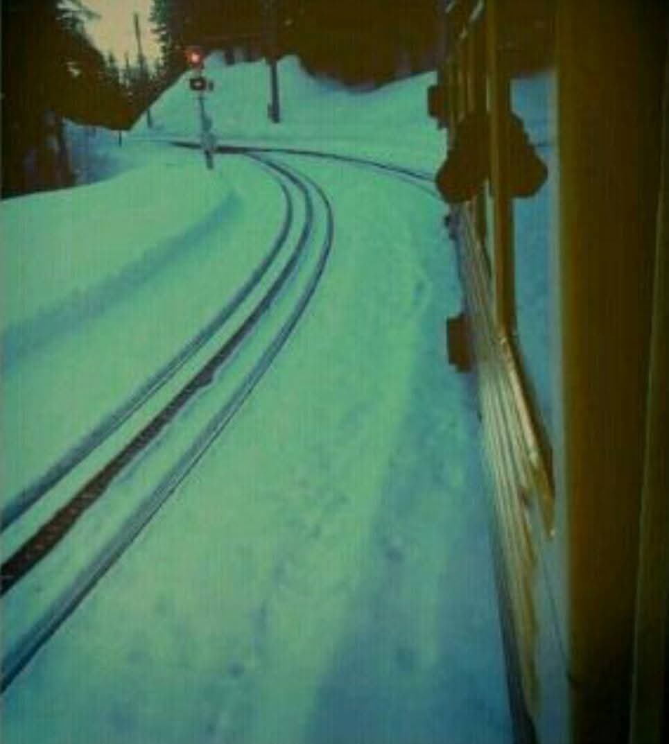 Jungfrau railway tracks covered in snow — Switzerland, 2014